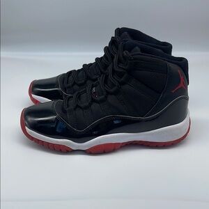 Nike Air Jordan 11 Retro Playoffs “Bred” Black and Red High-Top Sneaker